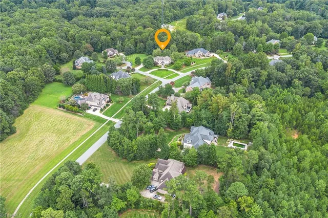 $975,000 | 5603 Monk Court, Summerfield, NC 27358