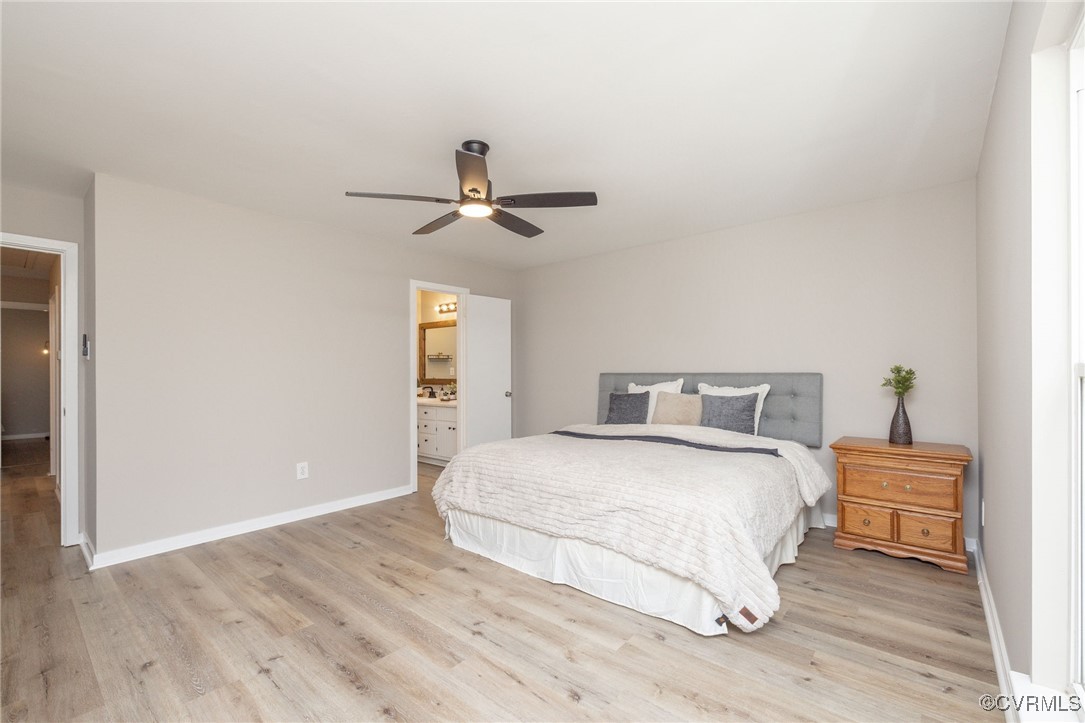 3018 3 Bridges Road Midlothian, VA 23112 - Photo 15 of 30 Bedroom featuring light wood finished floors, base