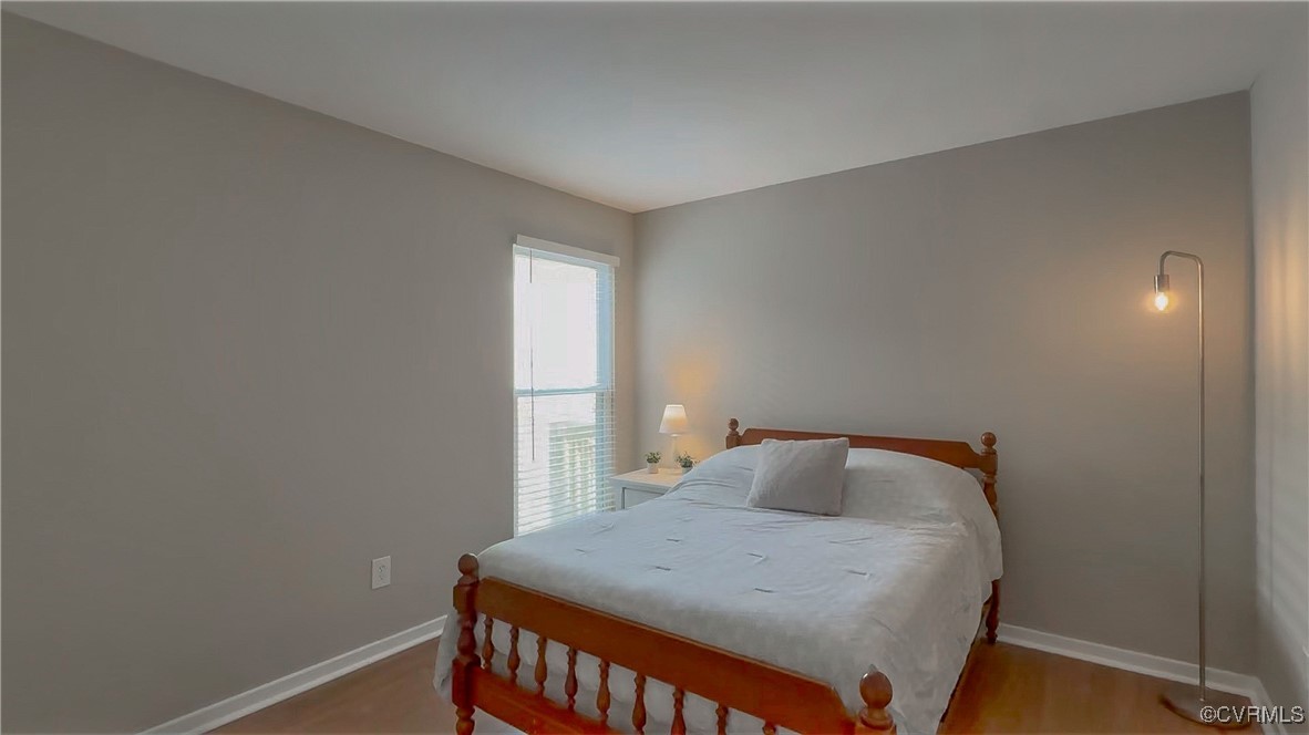 3018 3 Bridges Road Midlothian, VA 23112 - Photo 20 of 30 Bedroom featuring baseboards and wood finished flo