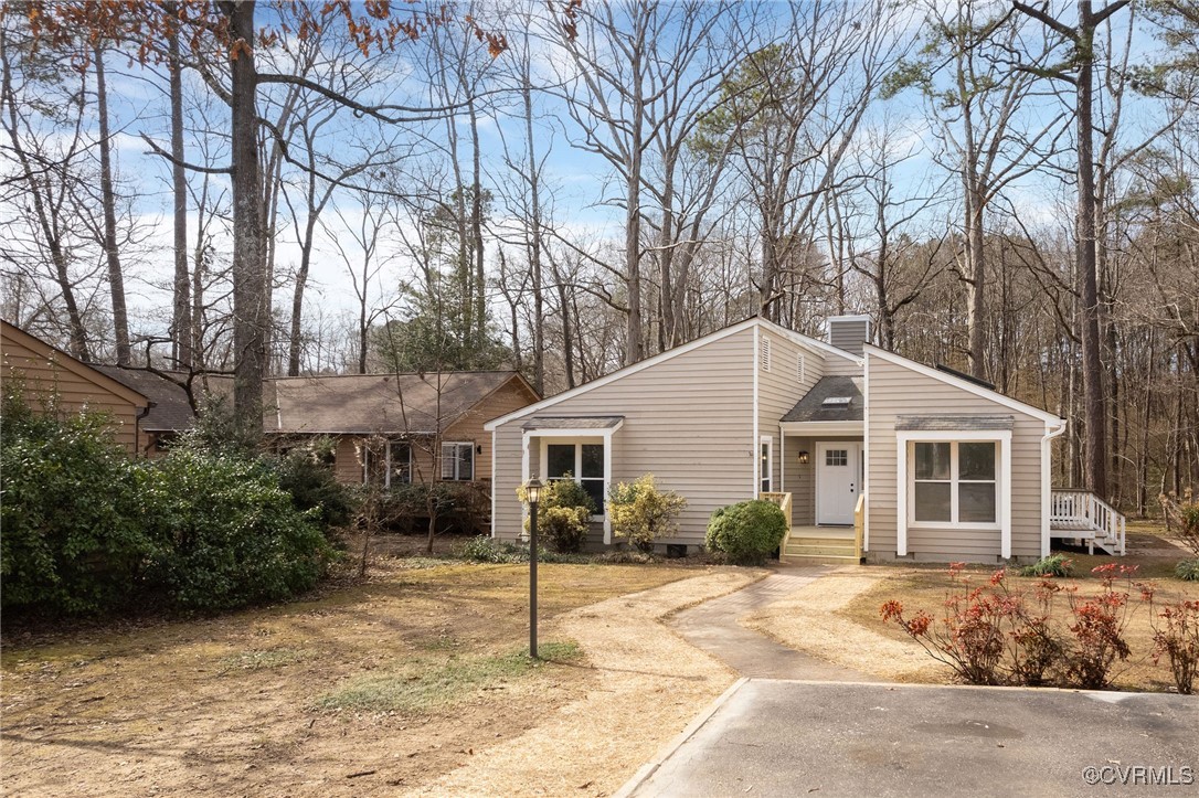 3018 3 Bridges Road Midlothian, VA 23112 - Photo 2 of 30 Mid-century inspired home with a chimney