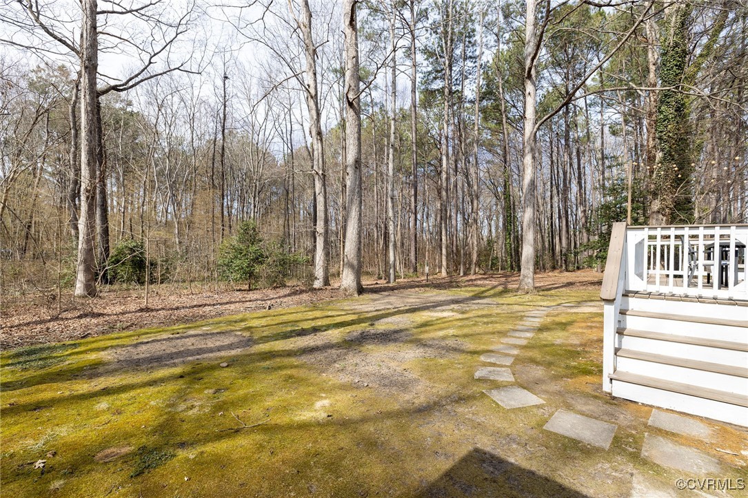 3018 3 Bridges Road Midlothian, VA 23112 - Photo 24 of 30 View of yard featuring a wooded view