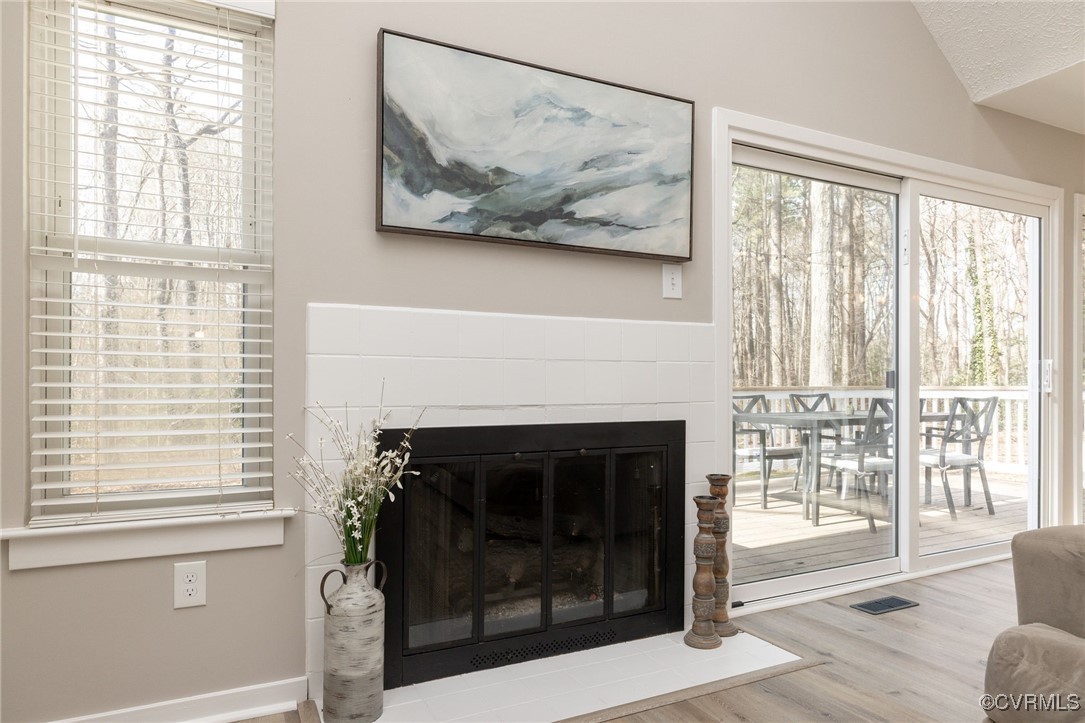 3018 3 Bridges Road Midlothian, VA 23112 - Photo 7 of 30 Living room featuring visible vents, a fireplace w