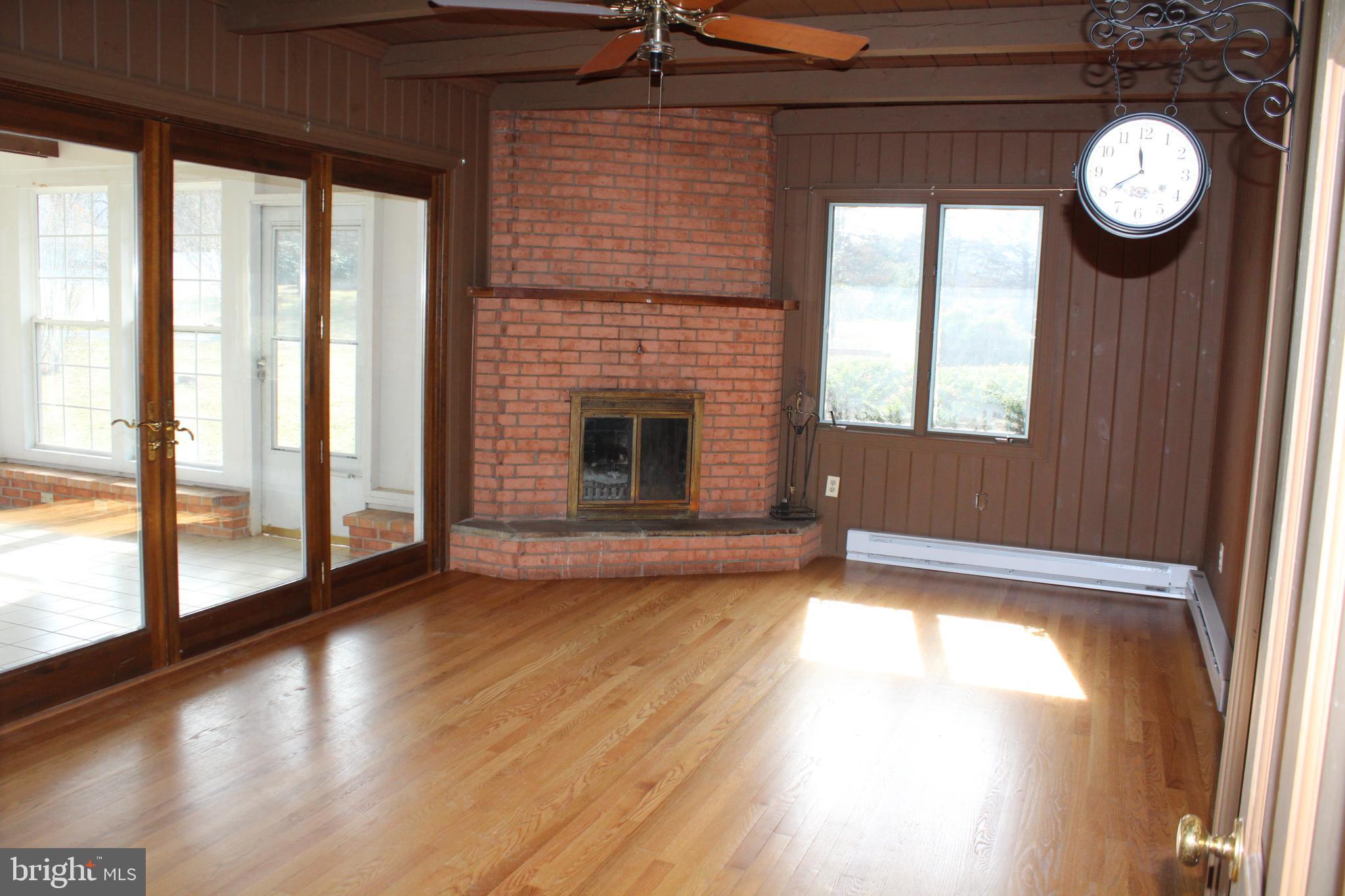429 Dungadin Road Front Royal, VA 22630 - Photo 6 of 40 Family room with fireplace