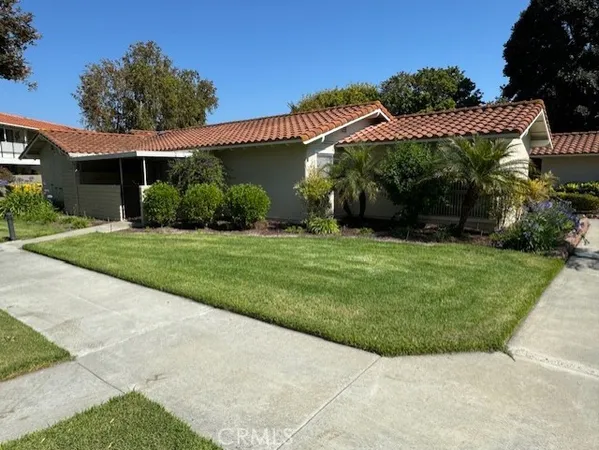 a view of a house with a garden