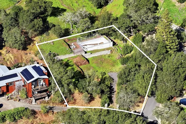 an aerial view of house with outdoor space
