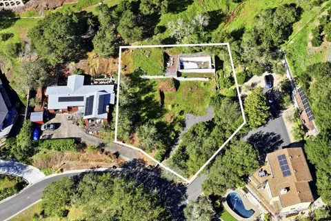 an aerial view of house with outdoor space