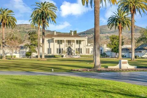 a view of swimming pool with outdoor seating