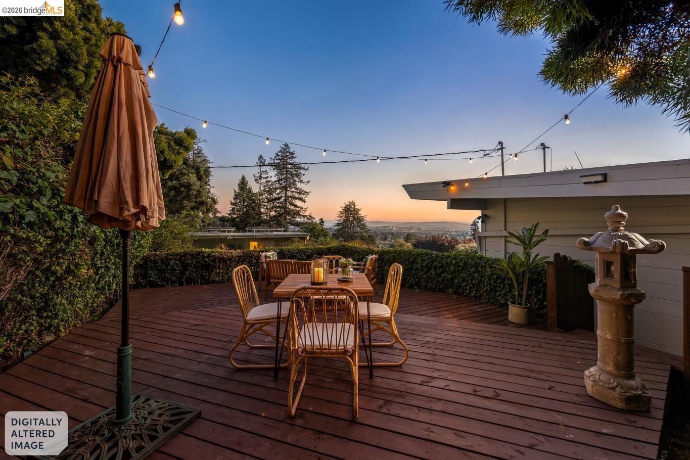 2301 Oak Street Berkeley, CA 94708 - Photo 46 of 61 Expansive wood-finish deck with string lighting overhead