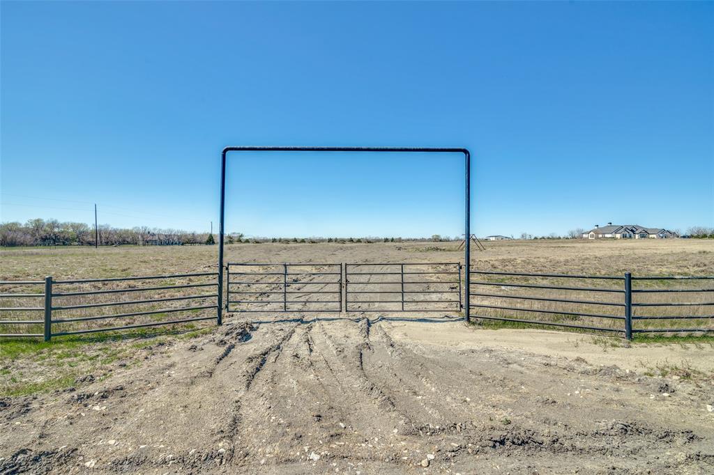 1350 Klutts Road Rockwall, TX 75032 - Photo 4 of 9 Steel pipe double gate