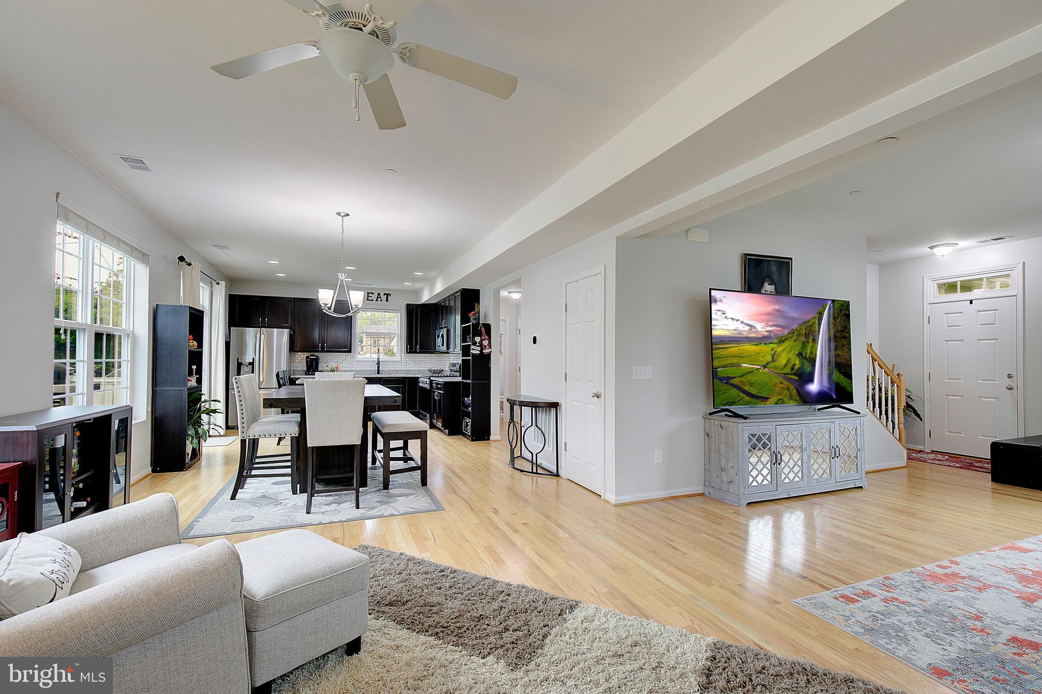 403 Venton Road Edgewater, MD 21037 - Photo 10 of 62 a living room with furniture and a flat screen tv