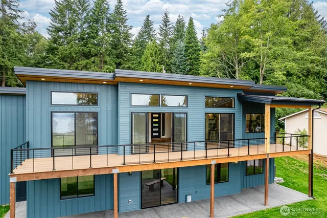 a view of a lake with a big yard