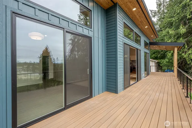 a bathroom with a sink a mirror and a bathtub