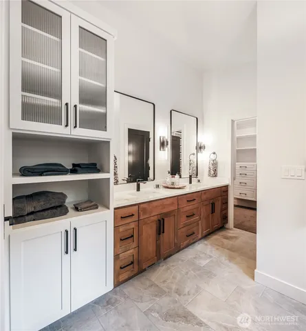 a bathroom with a bathtub and shower