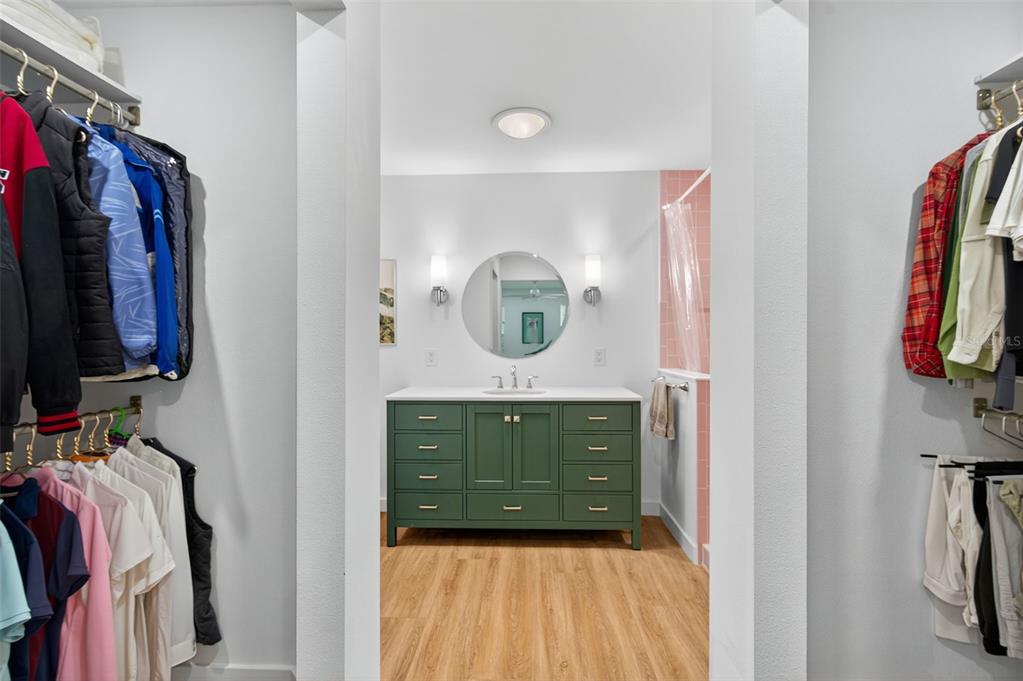 4916 Troon Lane New Port Richey, FL 34655 - Photo 13 of 53 a bedroom with a bed and a mirror