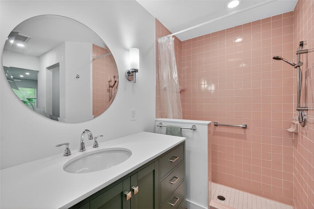 4916 Troon Lane New Port Richey, FL 34655 - Photo 15 of 53 a bathroom with a sink and a mirror