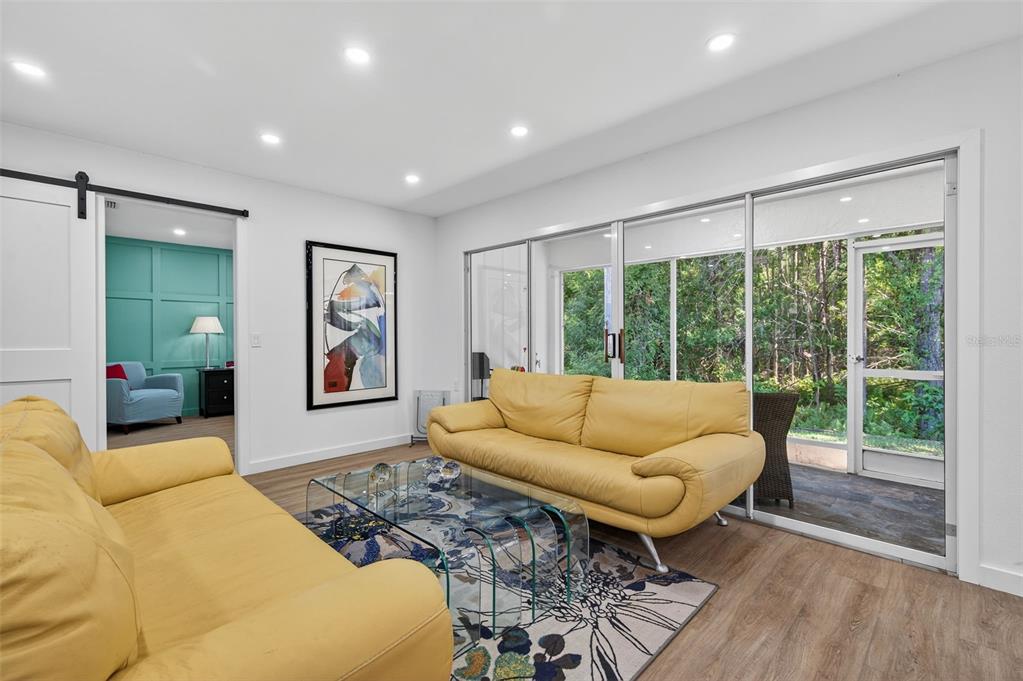 4916 Troon Lane New Port Richey, FL 34655 - Photo 18 of 53 a living room with furniture and a large window