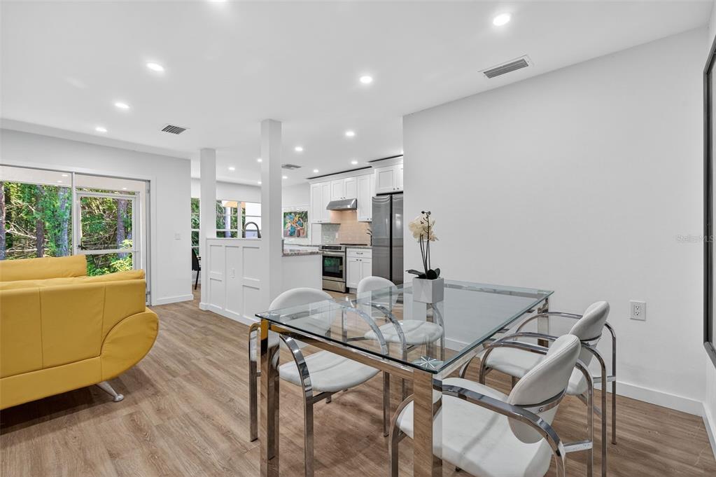 4916 Troon Lane New Port Richey, FL 34655 - Photo 23 of 53 a living room with furniture and a table