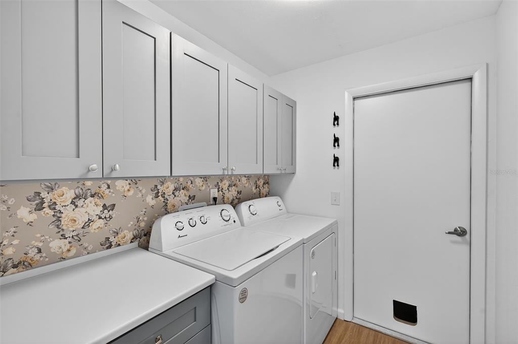 4916 Troon Lane New Port Richey, FL 34655 - Photo 32 of 53 a bathroom with a sink and a mirror