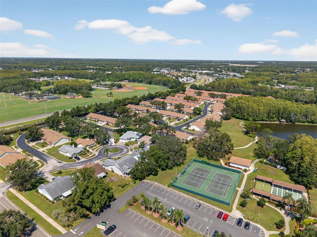 4916 Troon Lane New Port Richey, FL 34655 - Photo 45 of 53 an aerial view of residential houses with outdoor space