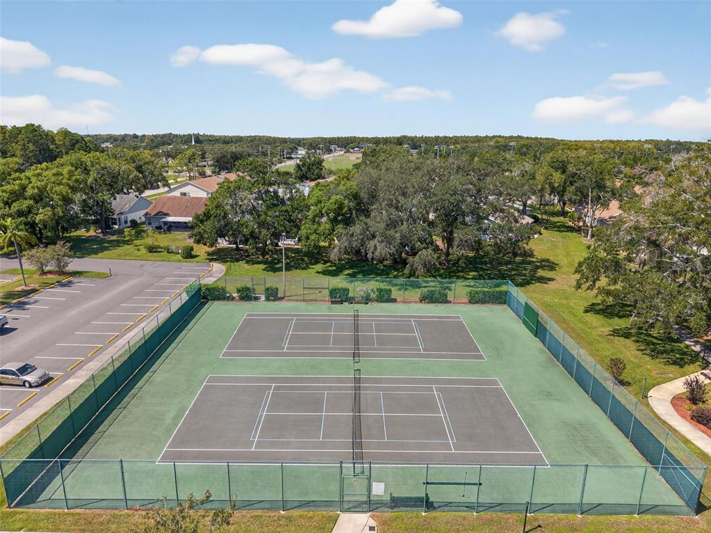 4916 Troon Lane New Port Richey, FL 34655 - Photo 47 of 53 a view of a tennis court