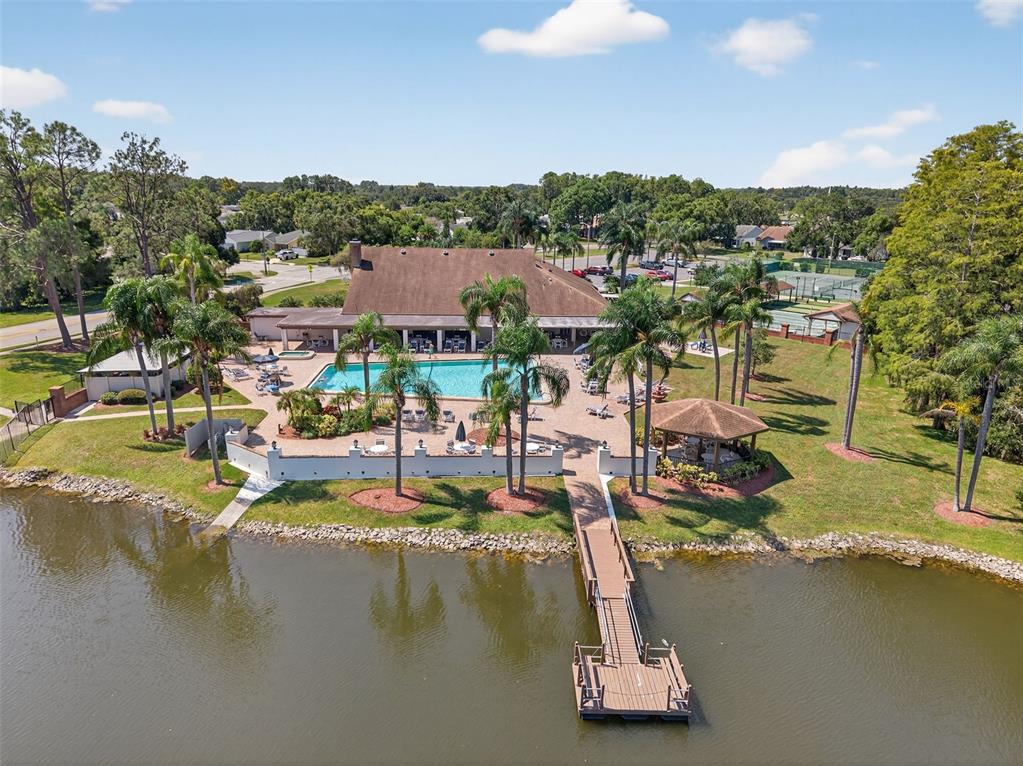 4916 Troon Lane New Port Richey, FL 34655 - Photo 50 of 53 a view of a lake with houses