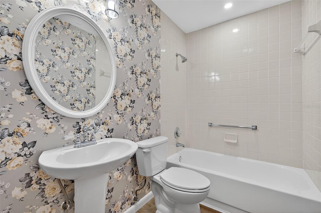 4916 Troon Lane New Port Richey, FL 34655 - Photo 10 of 53 a bathroom with a sink and a mirror