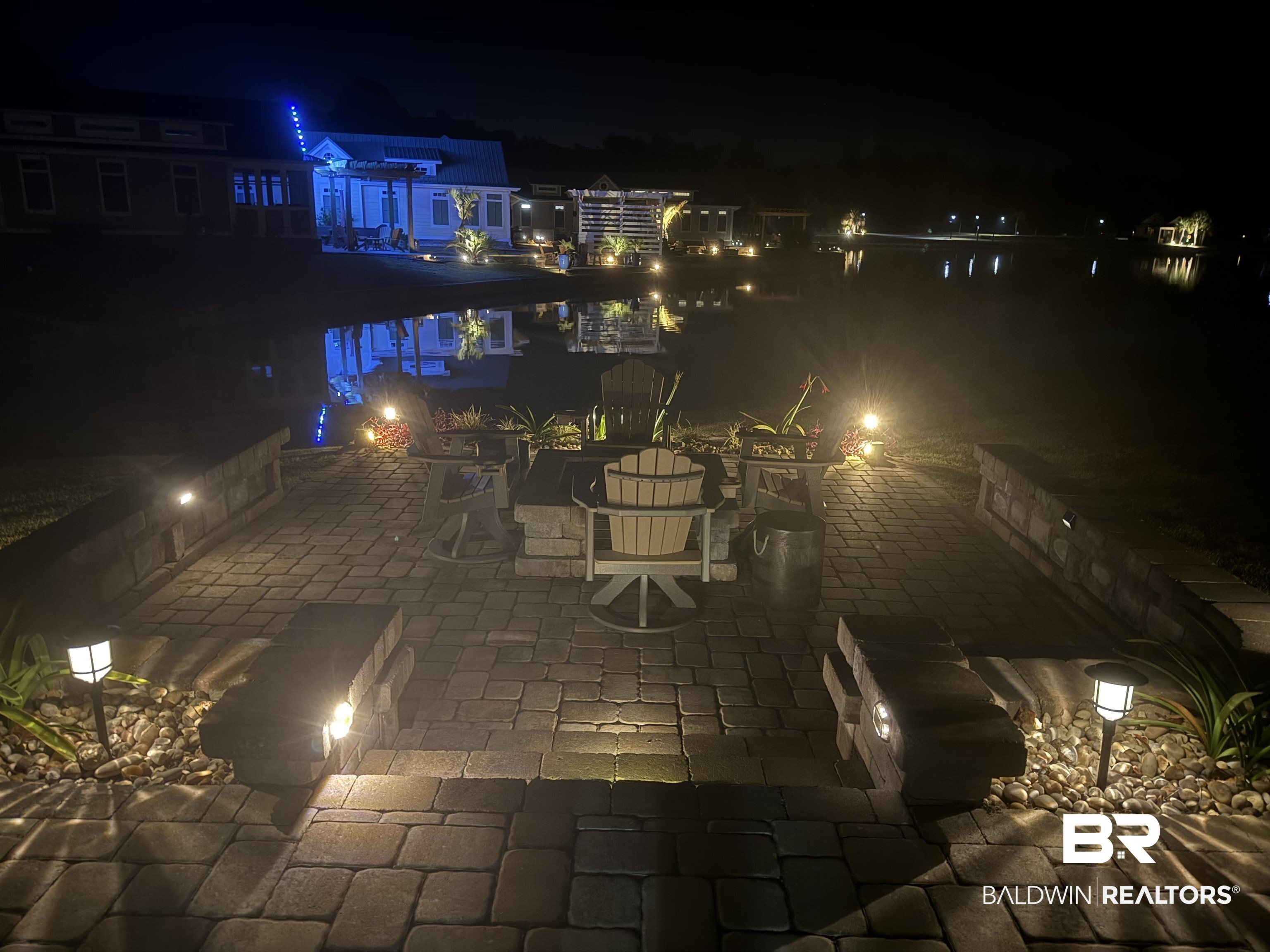 28238 Migratory Way Elberta, AL 36530 - Photo 23 of 58 Patio at twilight featuring a patio and outdoor dining area