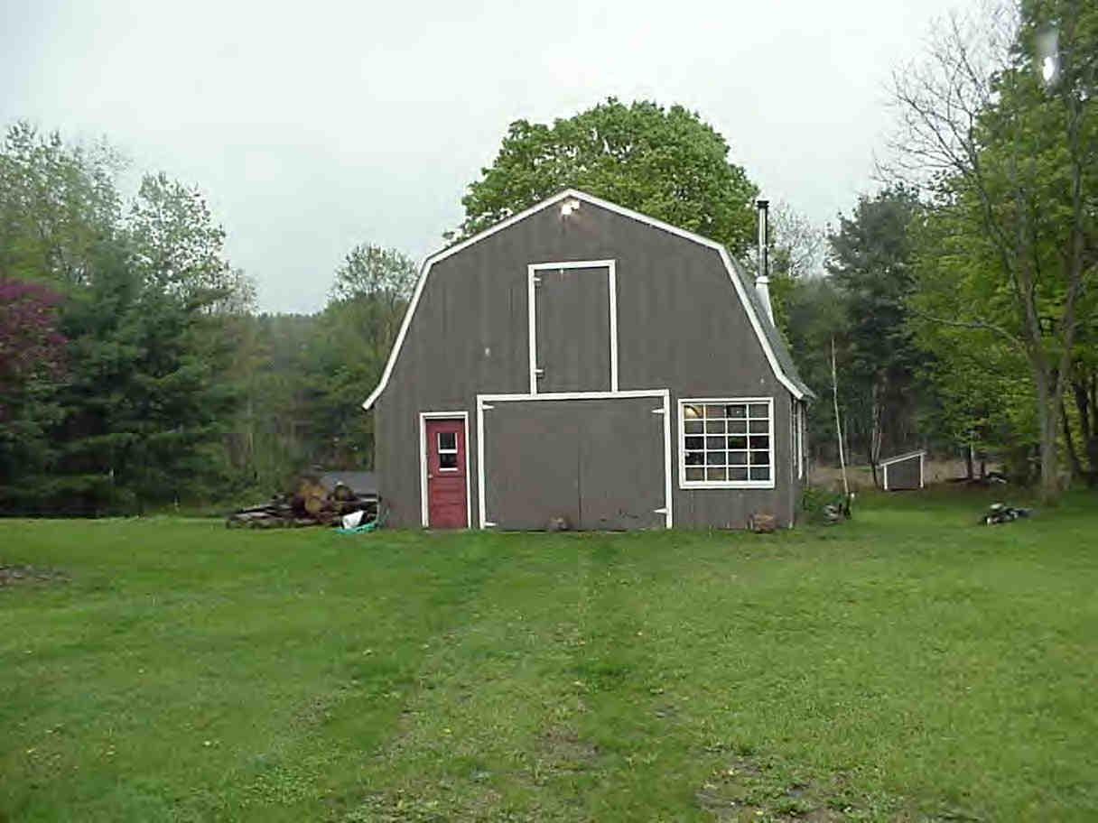 2785 State Road Richmond, MA 01254 - Photo 5 of 5 a front view of a house with a yard