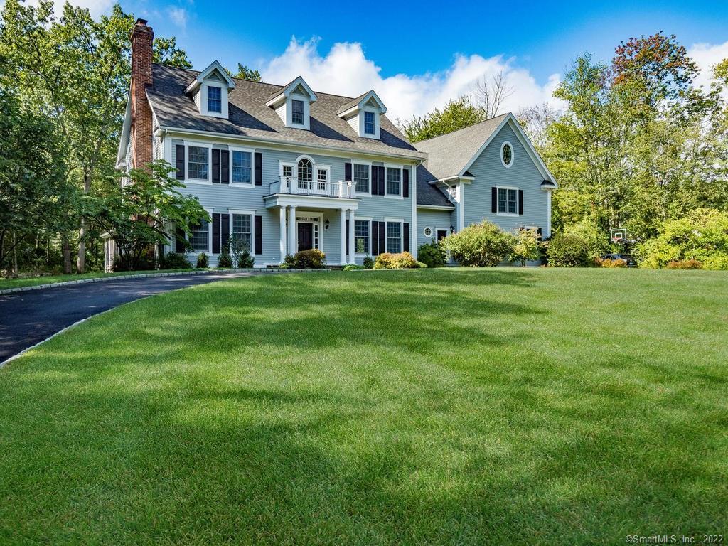 269 Sturges Ridge Road Wilton, CT 06897 - Photo 1 of 1 The elegant house is enhanced by the circular driveway