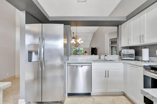 $475,000 | 7036 Galleon Cove Circle, Riviera Beach, FL 33418