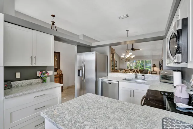 $475,000 | 7036 Galleon Cove Circle, Riviera Beach, FL 33418