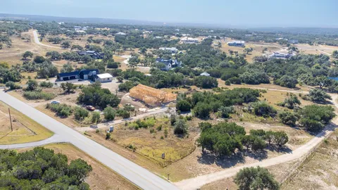 a view of a forest with a park