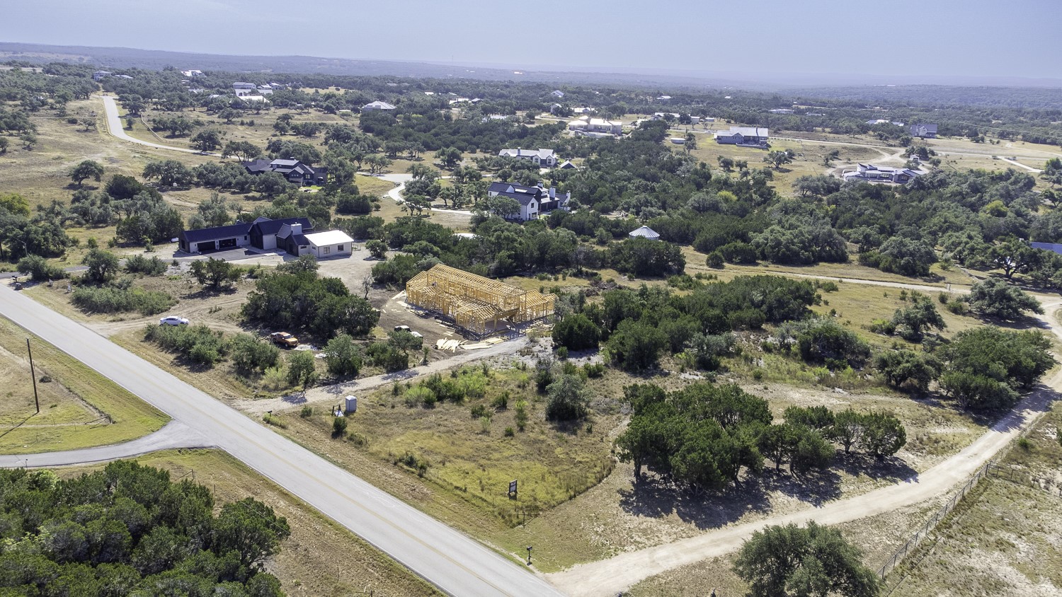 2251 West Fitzhugh Road Dripping Springs, TX 78620 - Photo 8 of 16 an aerial view of residential houses with outdoor space