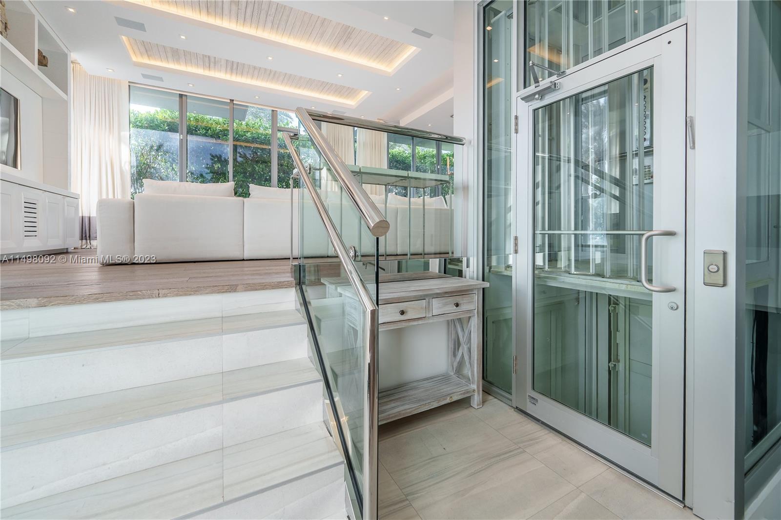 9501 Collins Avenue, Unit 1 Surfside, FL 33154 - Photo 2 of 35 a view of front door and porch