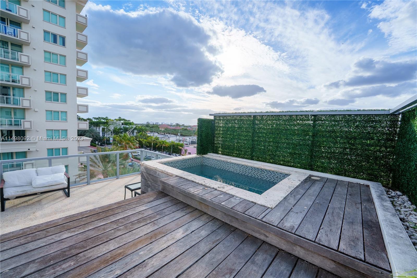 9501 Collins Avenue, Unit 1 Surfside, FL 33154 - Photo 26 of 35 a view of sitting area on roof deck