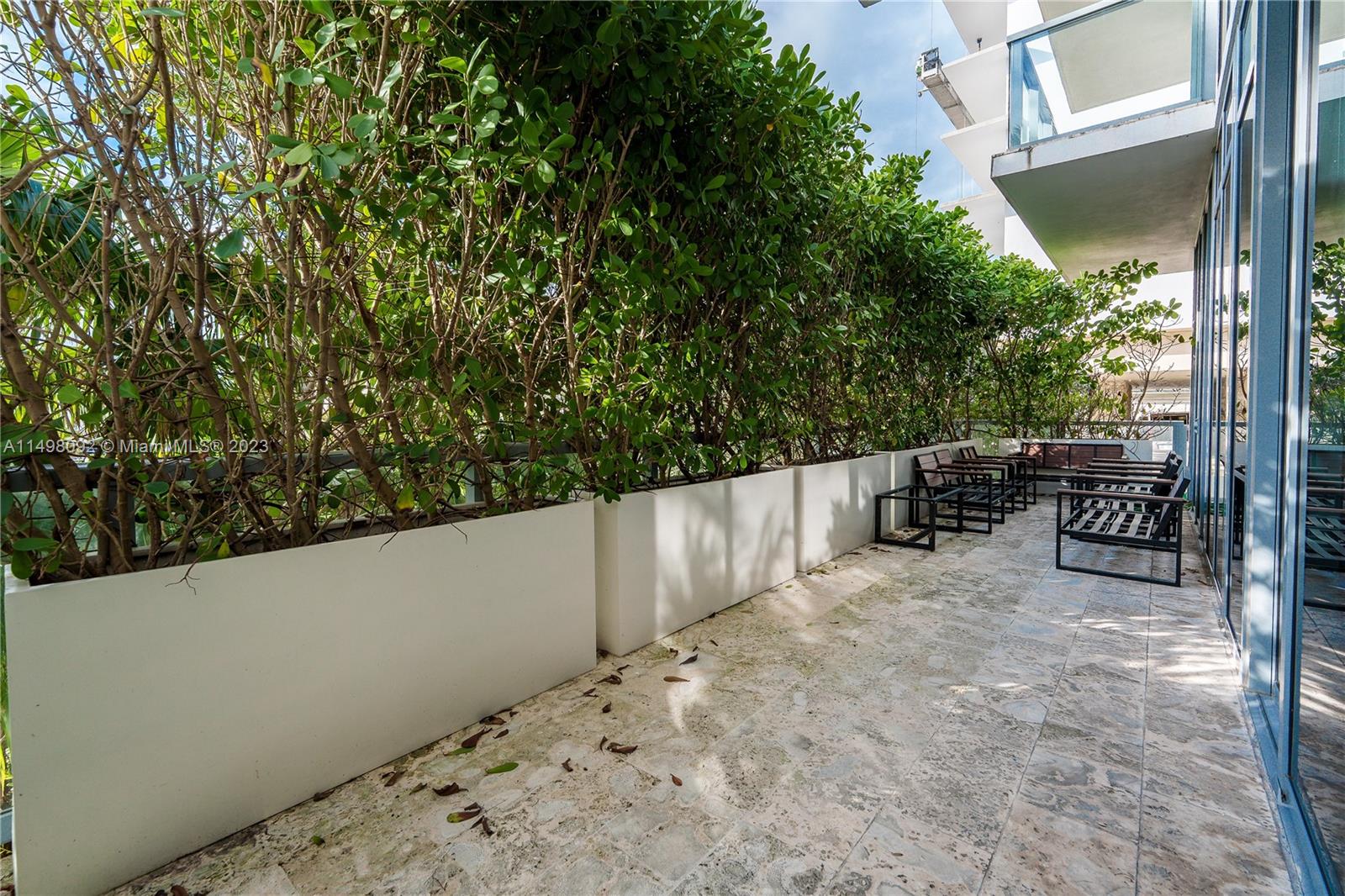 9501 Collins Avenue, Unit 1 Surfside, FL 33154 - Photo 27 of 35 a view of terrace with seating space