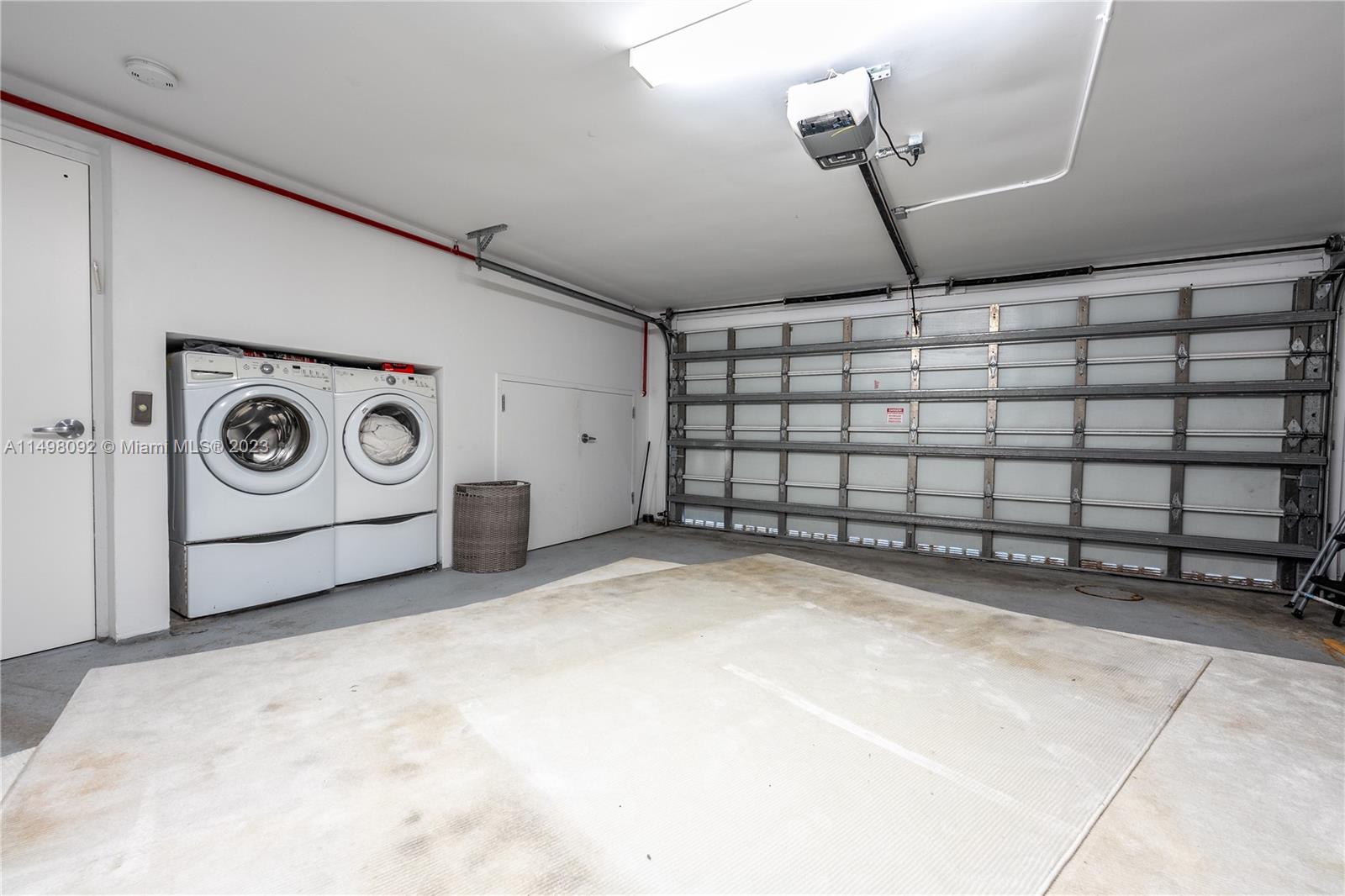 9501 Collins Avenue, Unit 1 Surfside, FL 33154 - Photo 35 of 35 a view of a garage