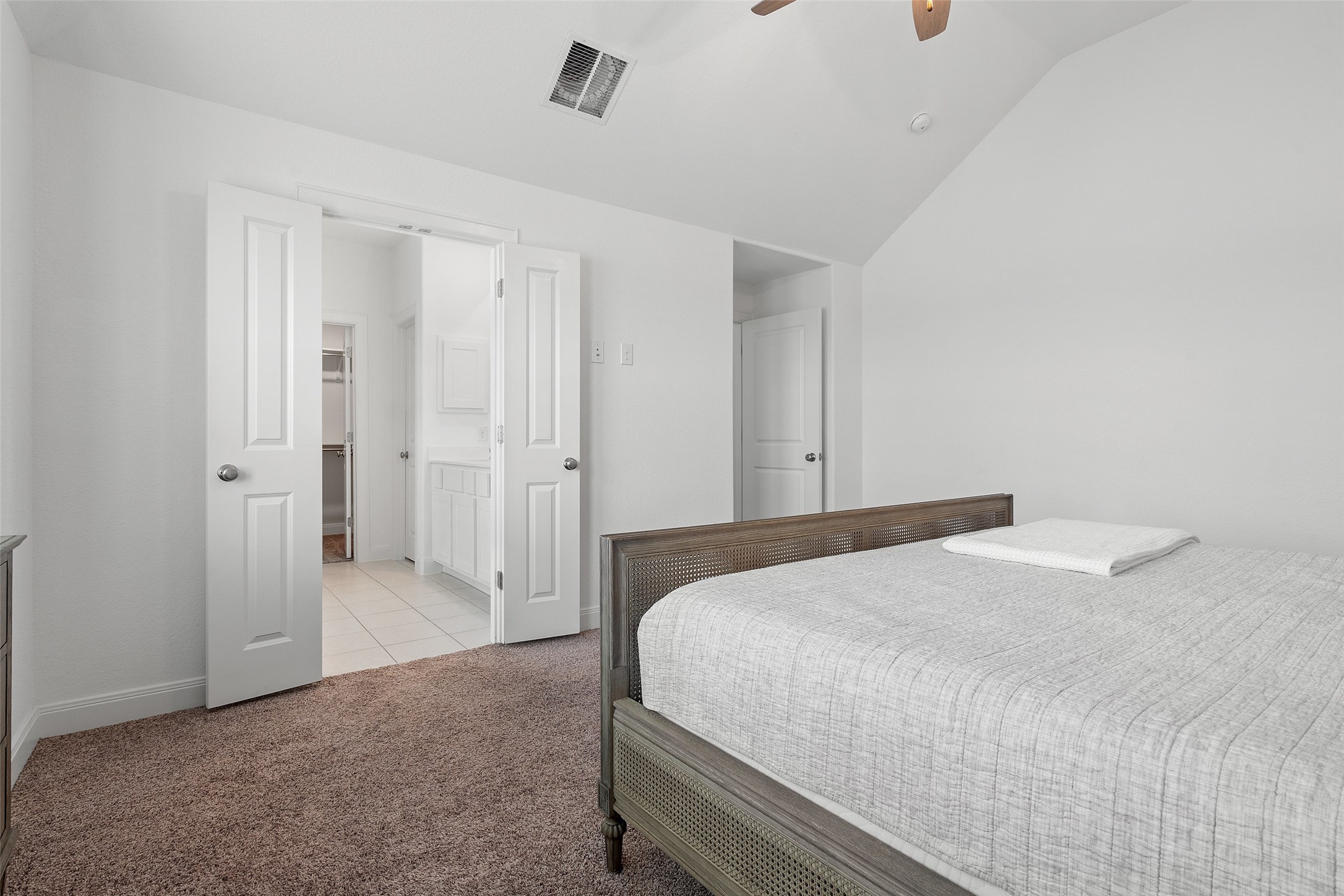 604 Pecan Bottom Trail Georgetown, TX 78628 - Photo 20 of 40 a spacious bedroom with a bed and closet