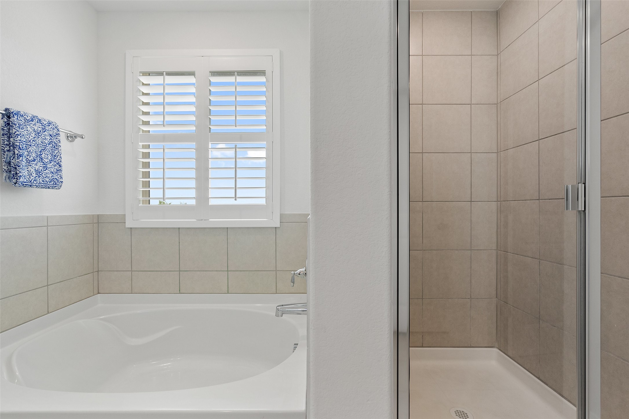 604 Pecan Bottom Trail Georgetown, TX 78628 - Photo 21 of 40 a white bath tub sitting next to a window