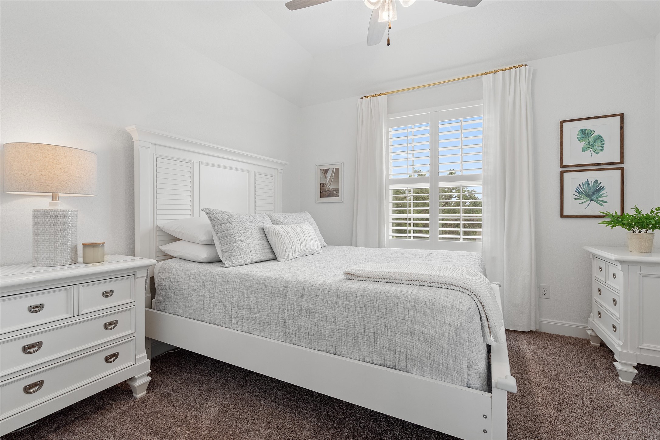 604 Pecan Bottom Trail Georgetown, TX 78628 - Photo 24 of 40 a bedroom with a bed a dresser and a window