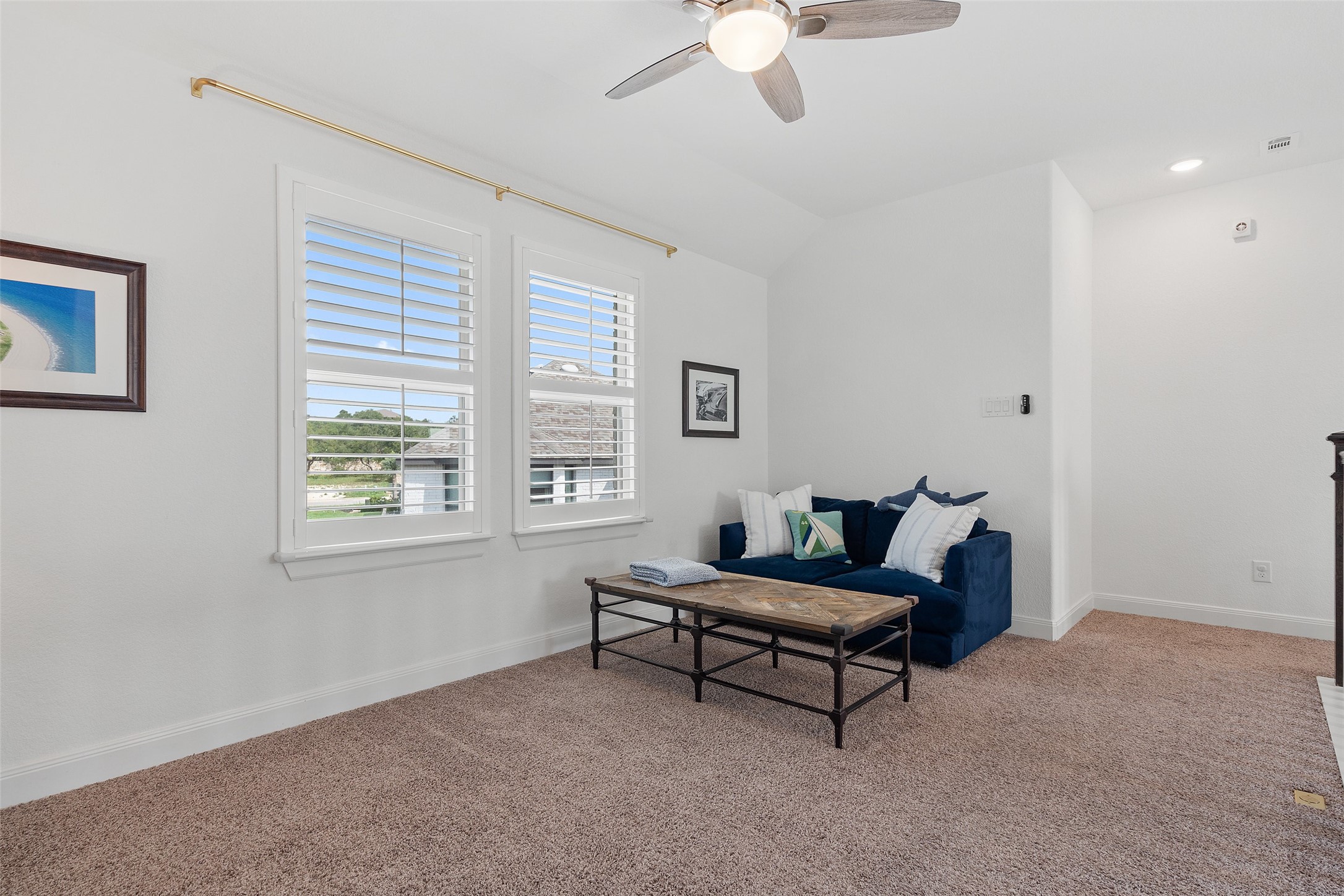 604 Pecan Bottom Trail Georgetown, TX 78628 - Photo 27 of 40 a living room with furniture and a chandelier