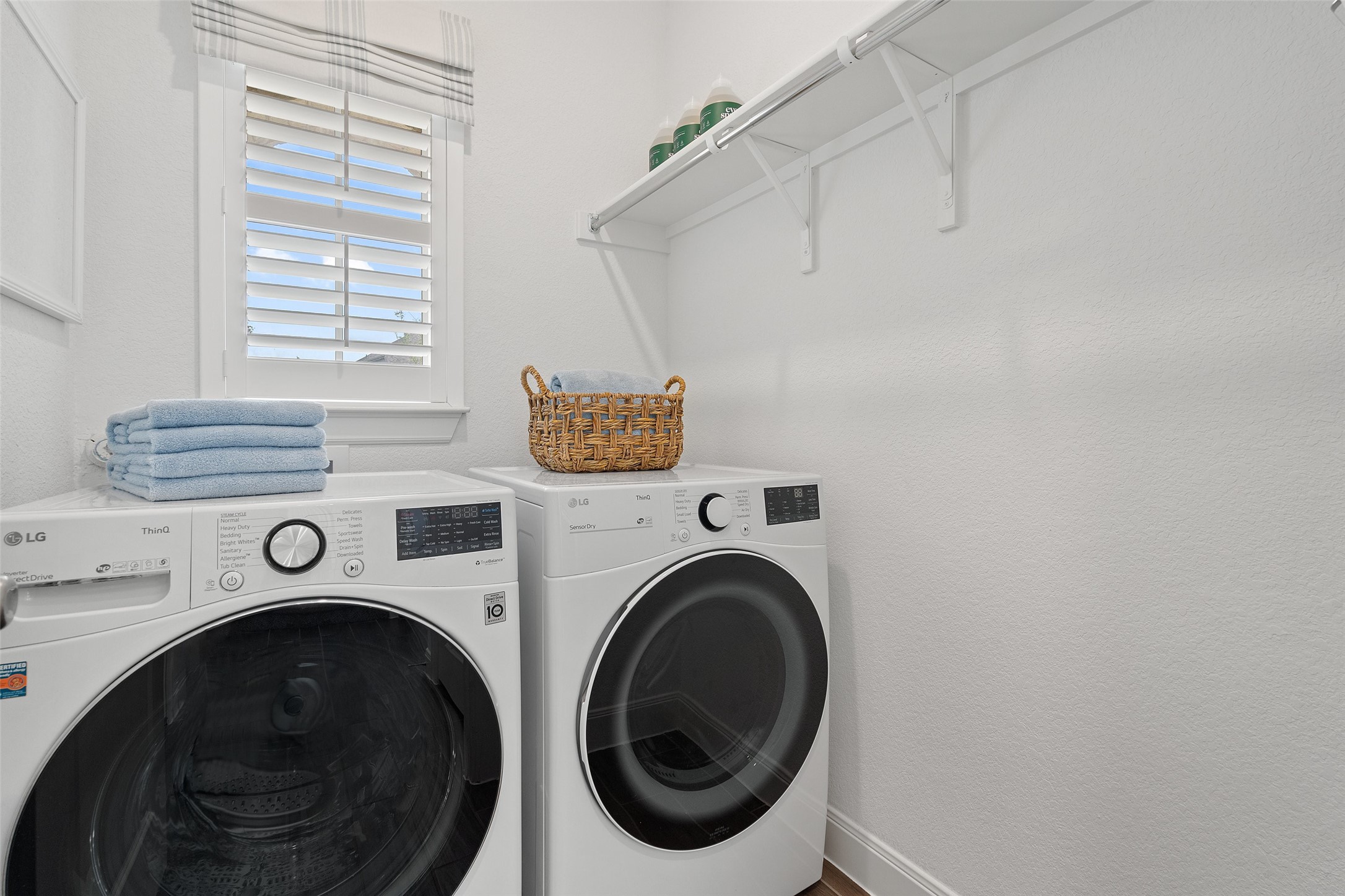 604 Pecan Bottom Trail Georgetown, TX 78628 - Photo 29 of 40 Washroom featuring washer and dryer and baseboards