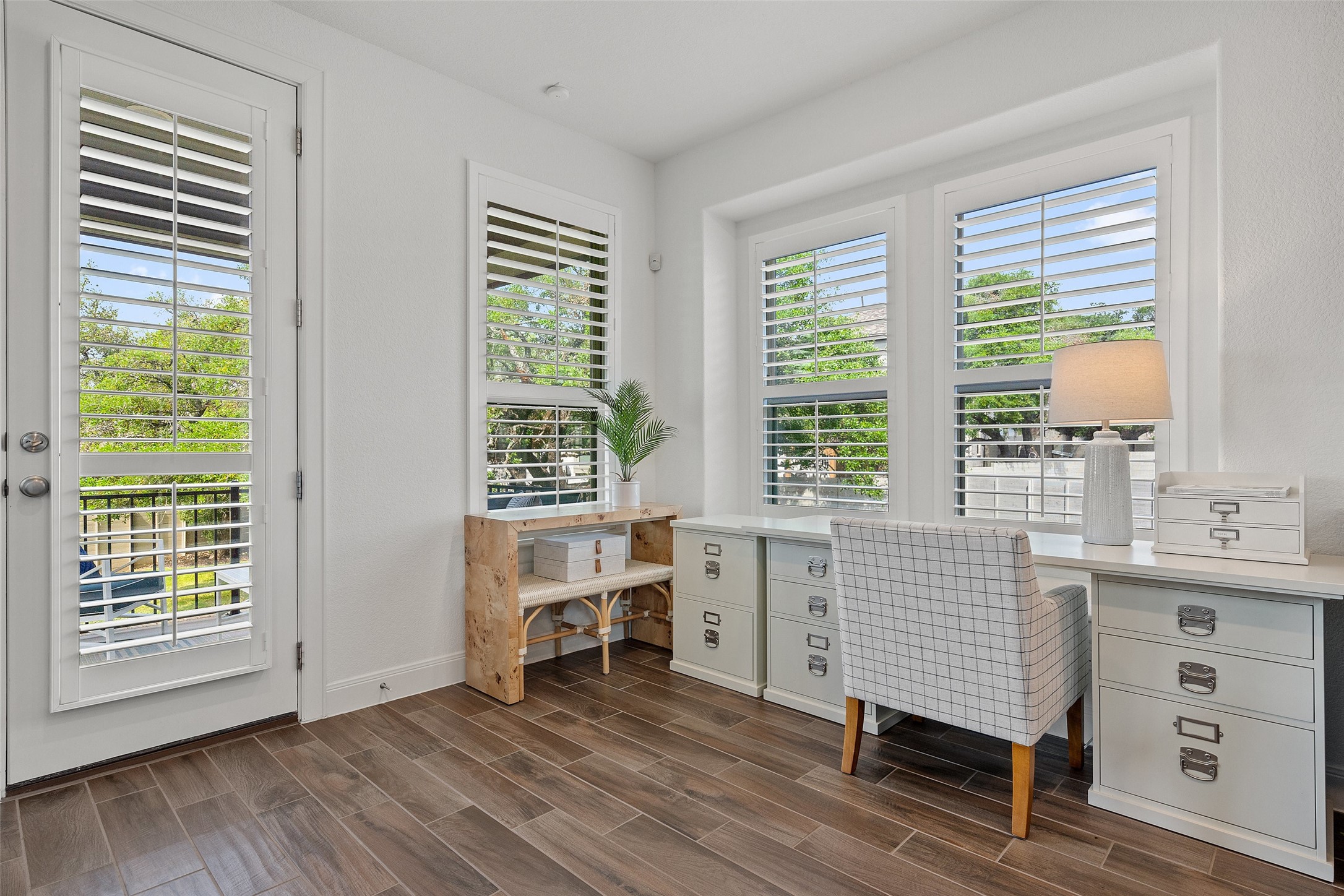 604 Pecan Bottom Trail Georgetown, TX 78628 - Photo 30 of 40 a view of a workspace with furniture and a window