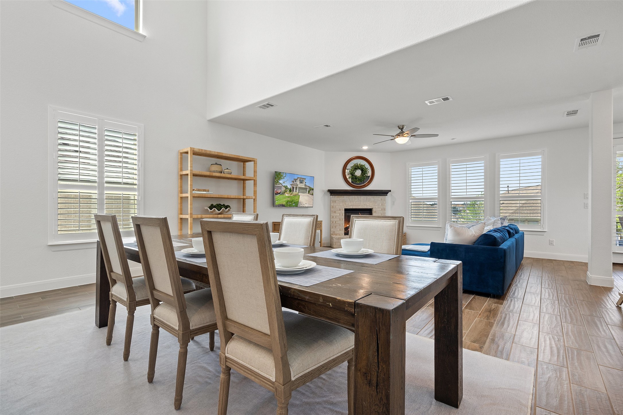604 Pecan Bottom Trail Georgetown, TX 78628 - Photo 8 of 40 a view of a dining room with furniture and wooden floor