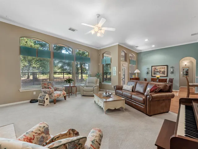 a bathroom with a sink double vanity granite and a mirror