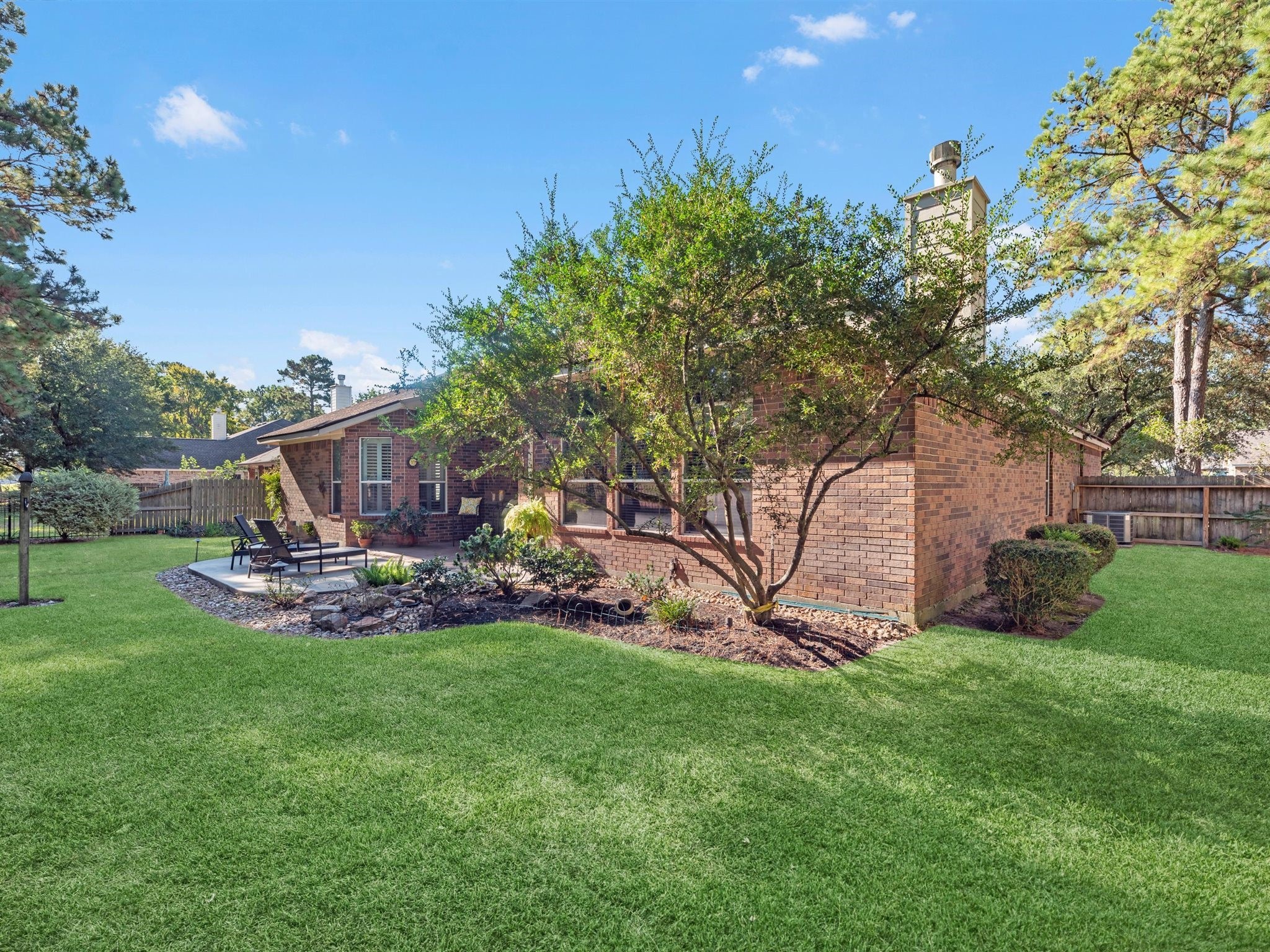 20471 Bentwood Oaks Drive Porter, TX 77365 - Photo 3 of 43 a view of a backyard with large trees