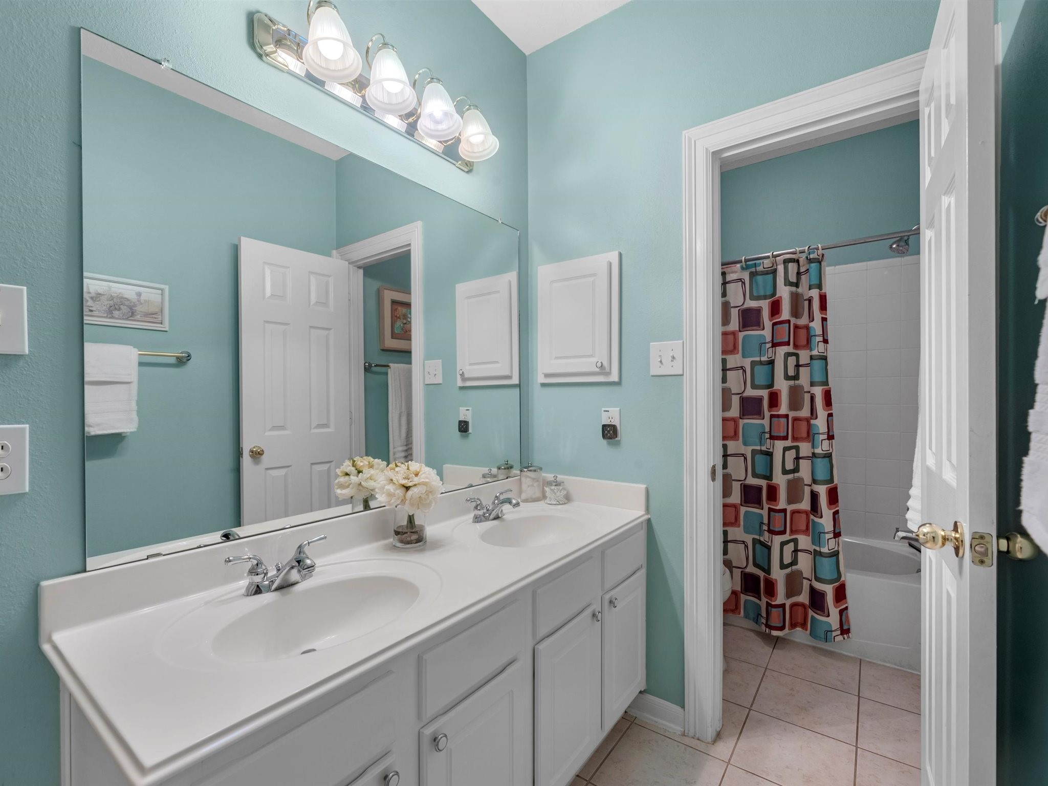 20471 Bentwood Oaks Drive Porter, TX 77365 - Photo 31 of 43 a bathroom with a sink and a mirror