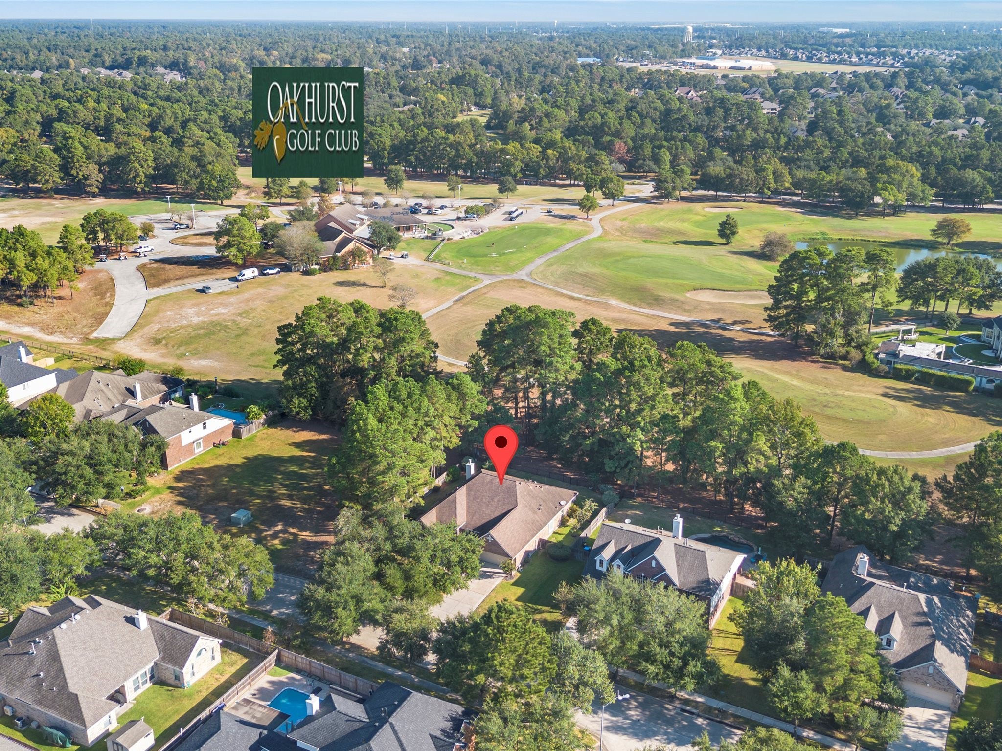 20471 Bentwood Oaks Drive Porter, TX 77365 - Photo 38 of 43 an aerial view of a house with a swimming pool yard and lake view