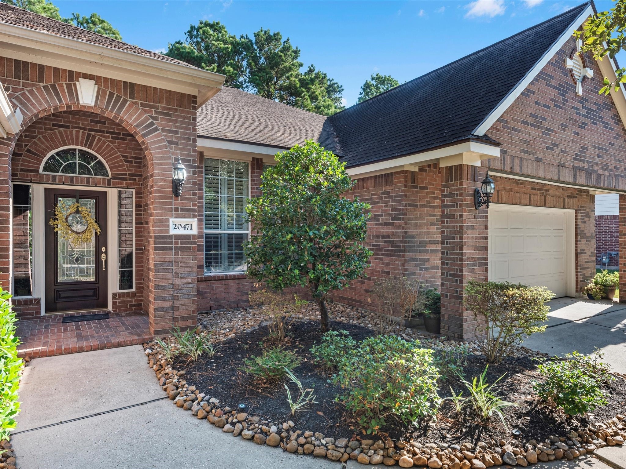 20471 Bentwood Oaks Drive Porter, TX 77365 - Photo 7 of 43 a front view of a house with garden