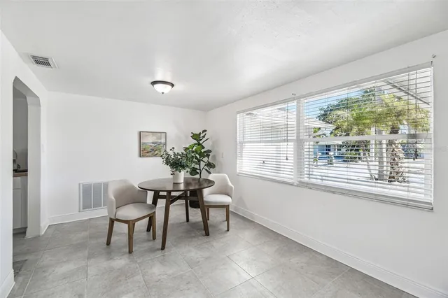 a kitchen with a sink stove and microwave